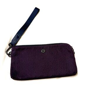 lululemon zippered wristlet in purple